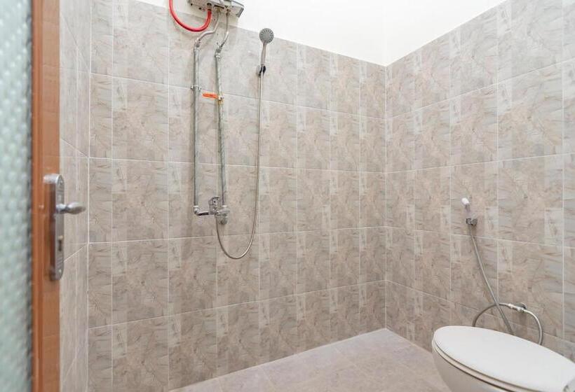 Hotel The Lima Guest House Syariah Mitra Reddoorz