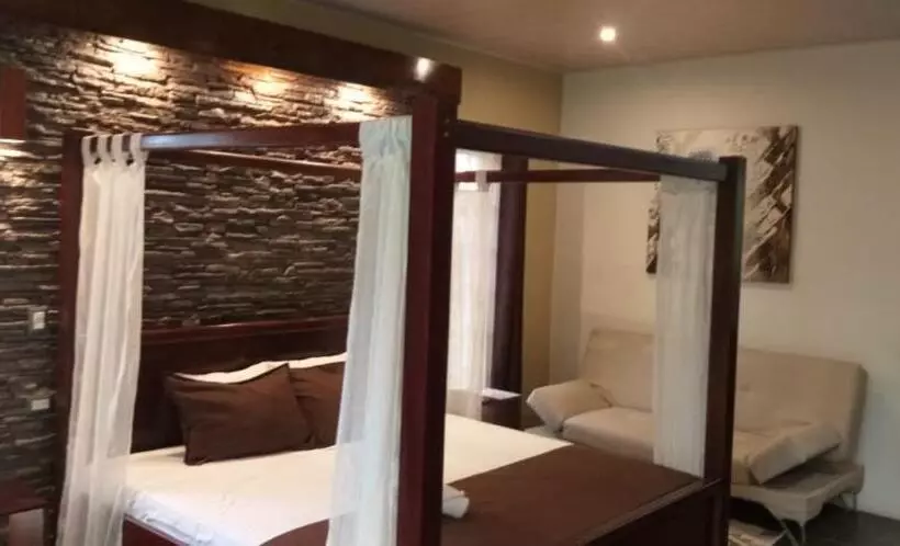 ホテル Tropical Suites & Villas