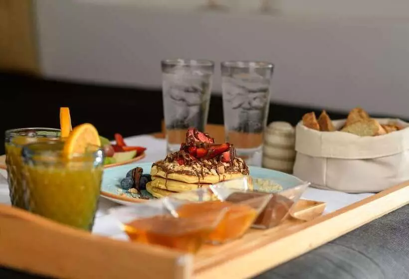 ホテル Above Blue Suites