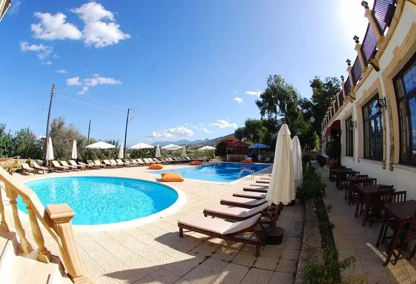 Отель Bellapais Monastery Village