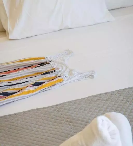 Отель Sunrise Suites & Apartments