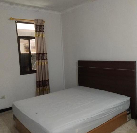 בית מלון כפרי Oyo 90590 Tian Residence