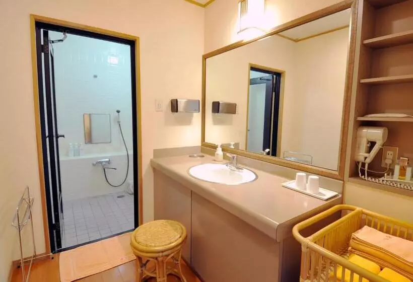 Отель Nisshokan Shinkan Baishokaku