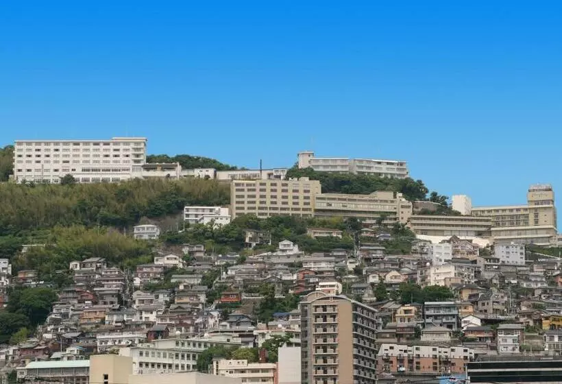 Отель Nisshokan Shinkan Baishokaku