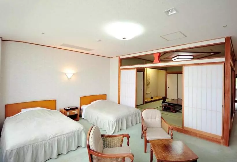 Отель Nisshokan Shinkan Baishokaku