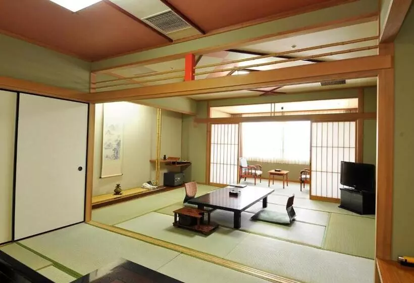 Отель Nisshokan Shinkan Baishokaku