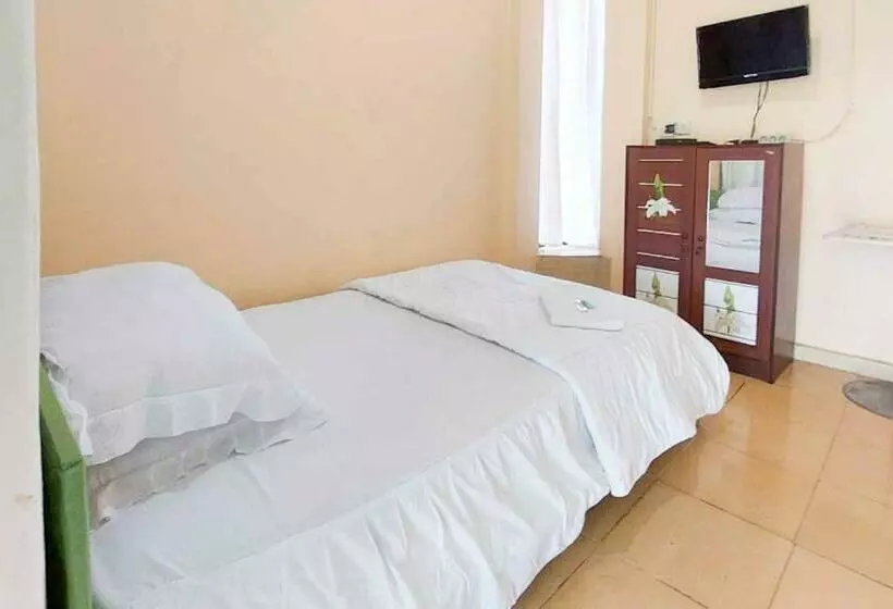 Hotelli Quattrick Dee Homestay Mitra Reddoorz