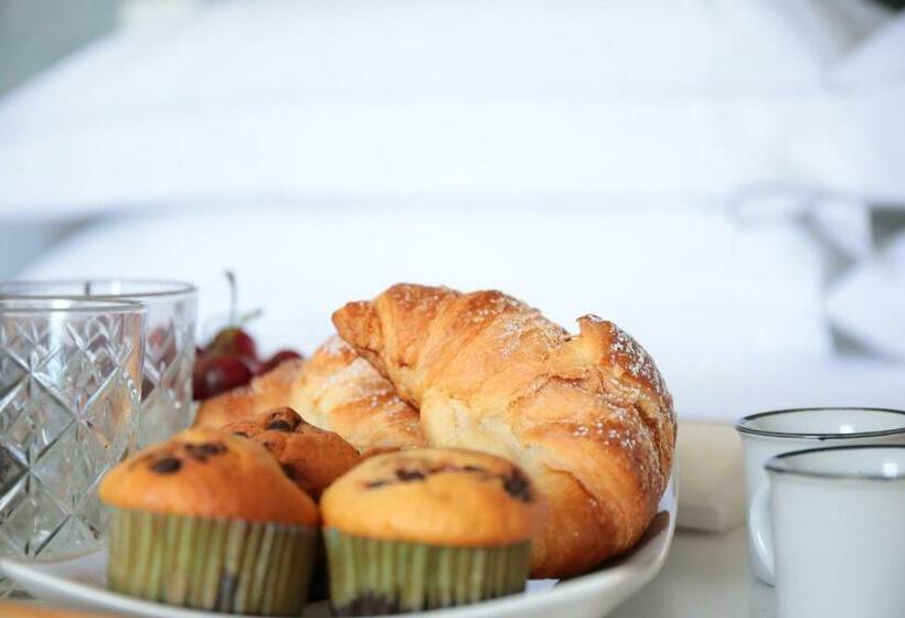 تختخواب و صبحانه Bella Mbriana