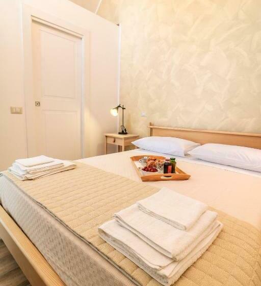 تختخواب و صبحانه Bella Mbriana