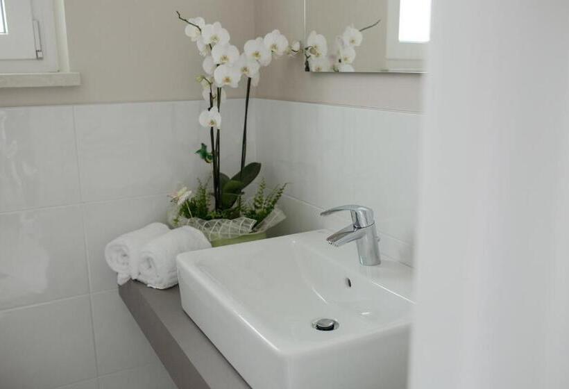 تختخواب و صبحانه Menta E Rosmarino Rooms