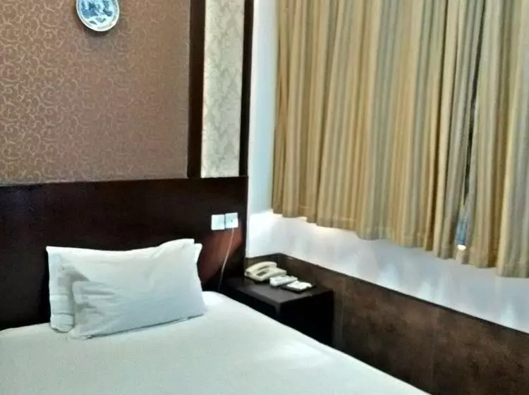Baolong Homelike Youyi Hotel