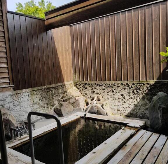 בית מלון כפרי Yufuin Onsen Hasuwa Inn