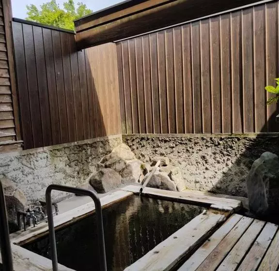 בית מלון כפרי Yufuin Onsen Hasuwa Inn