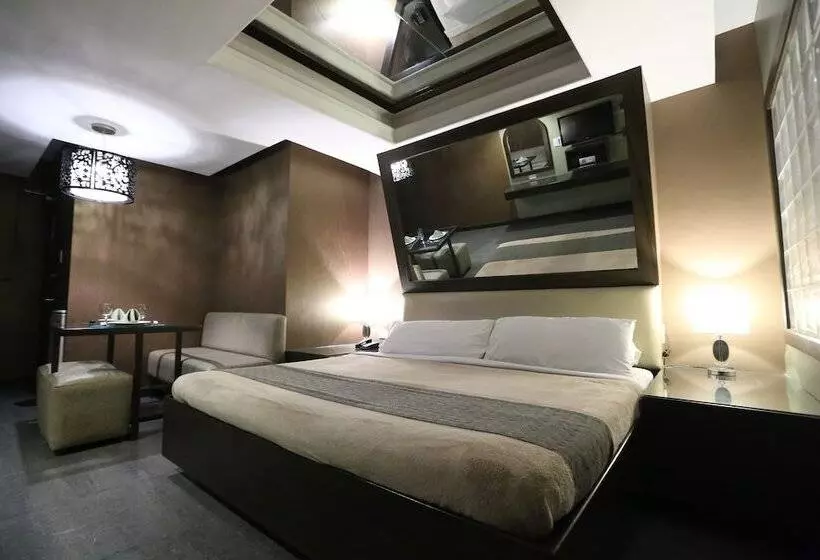 Отель Victoria Court Suites Pasig