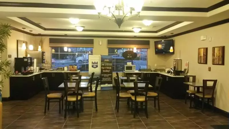 Отель Atria Inn & Suites