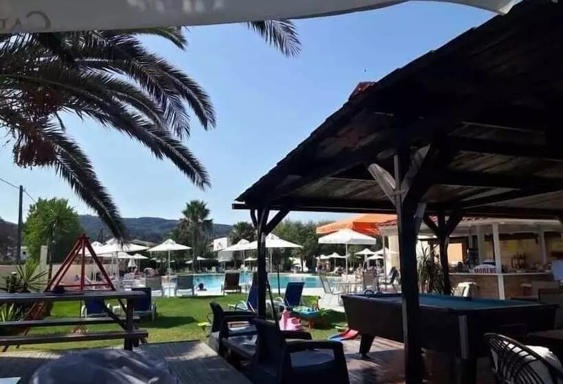 Отель Ninos On The Beach