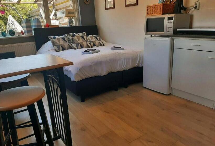 צימר Tuinhuis Duinroos Deluxe