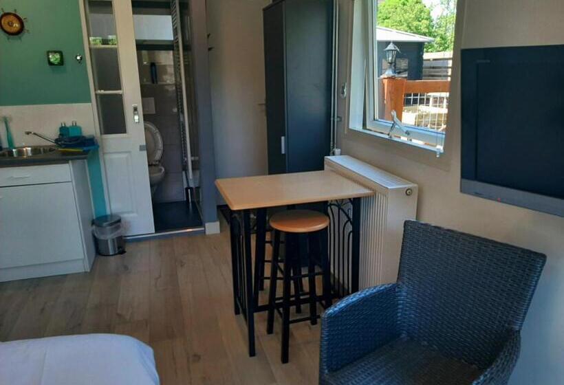 צימר Tuinhuis Duinroos Deluxe