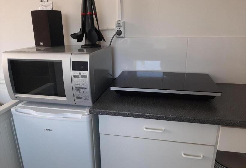 צימר Tuinhuis Duinroos Deluxe