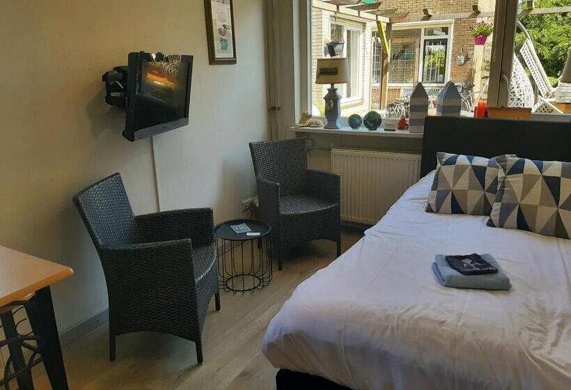 צימר Tuinhuis Duinroos Deluxe