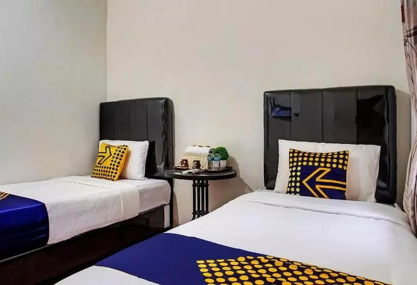 Hotelli Spot On 90896 Griya Atu Syariah