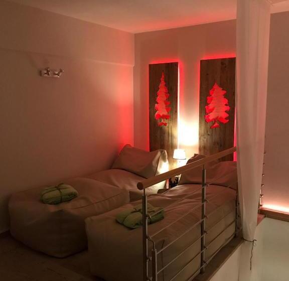 Отель Ciasa Ai Pini