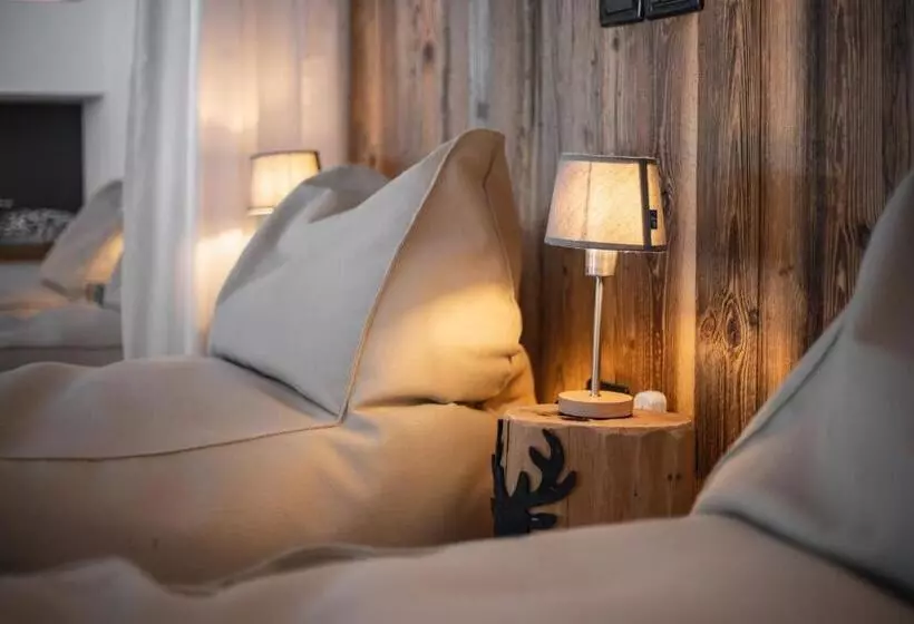 Отель Ciasa Ai Pini