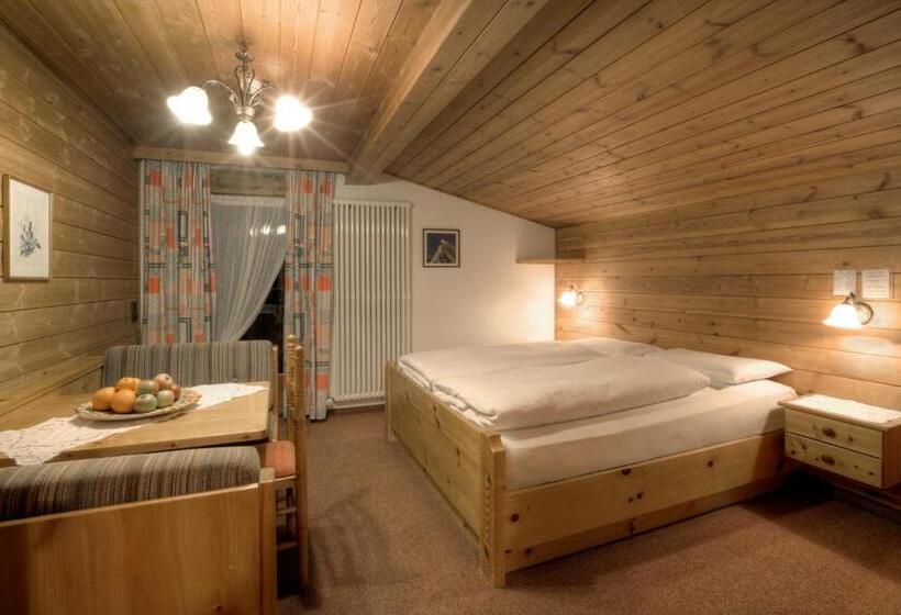 Отель Ciasa Ai Pini