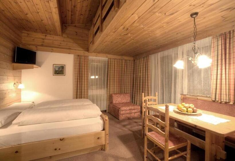 Отель Ciasa Ai Pini