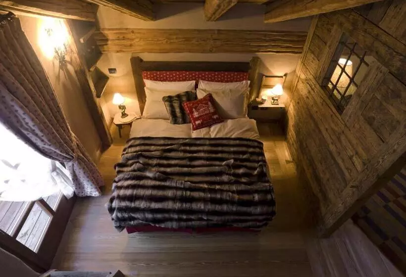 Отель Au Coeur Des Neiges & Spa