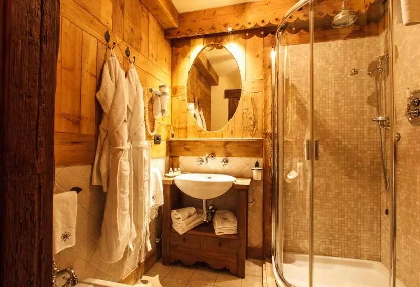 Отель Au Coeur Des Neiges & Spa