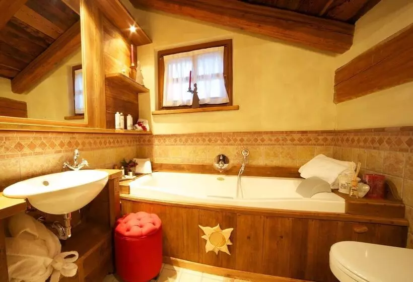 Отель Au Coeur Des Neiges & Spa