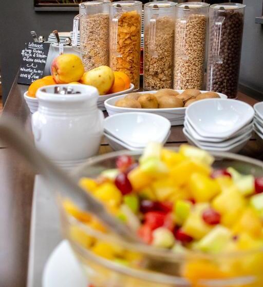 Orange Hotel Und Apartments