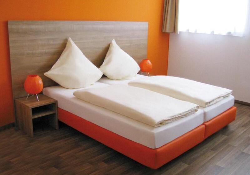 Orange Hotel Und Apartments
