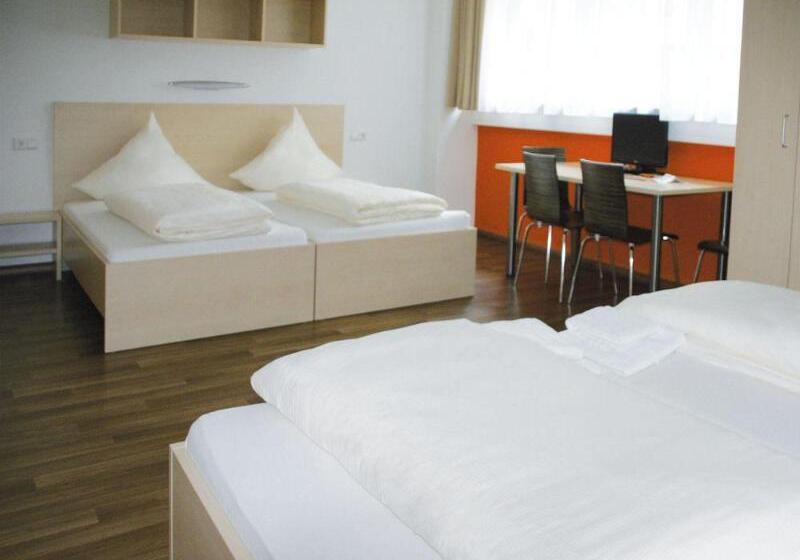 Orange Hotel Und Apartments