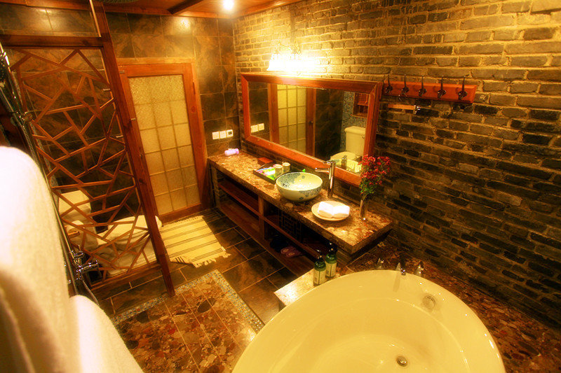 호텔 Blossom Hill Inn Lijiang Springland