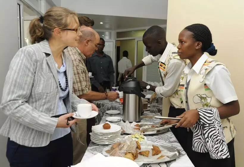 Отель Afrique Suites