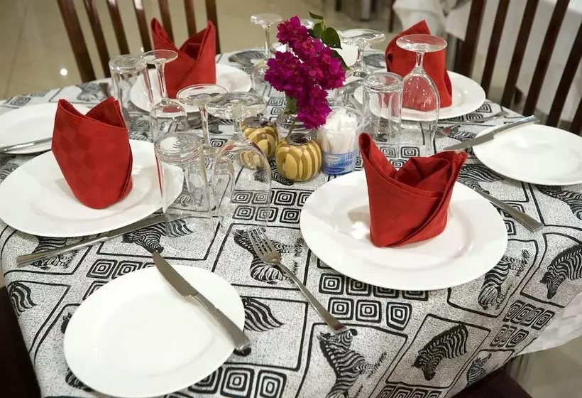 Отель Afrique Suites