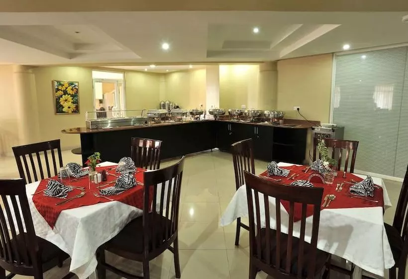 Отель Afrique Suites