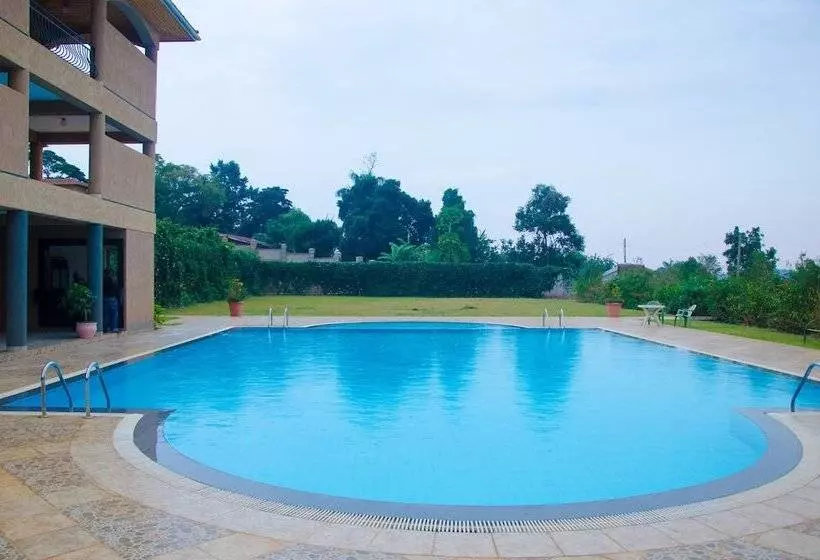 Отель Afrique Suites