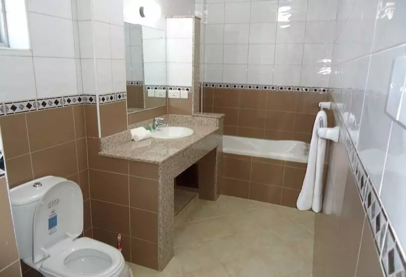 Отель Afrique Suites