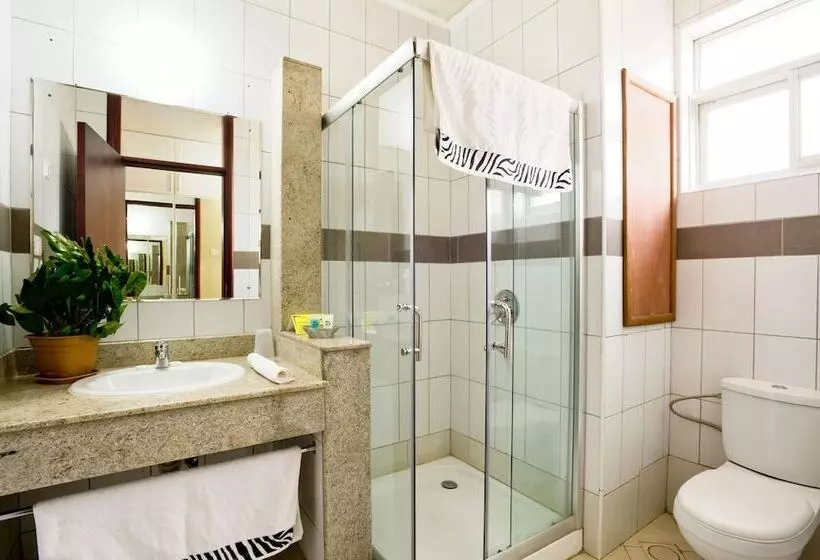 Отель Afrique Suites