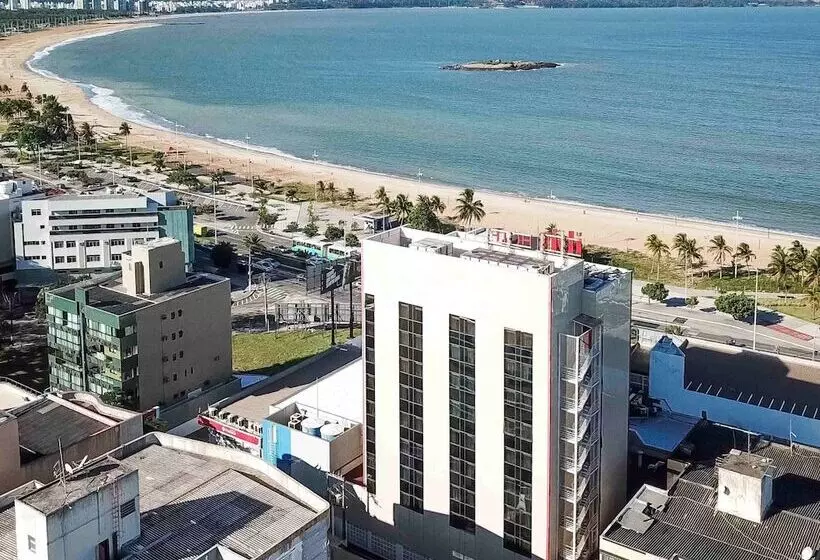 Отель Ibis Vitoria Praia De Camburi
