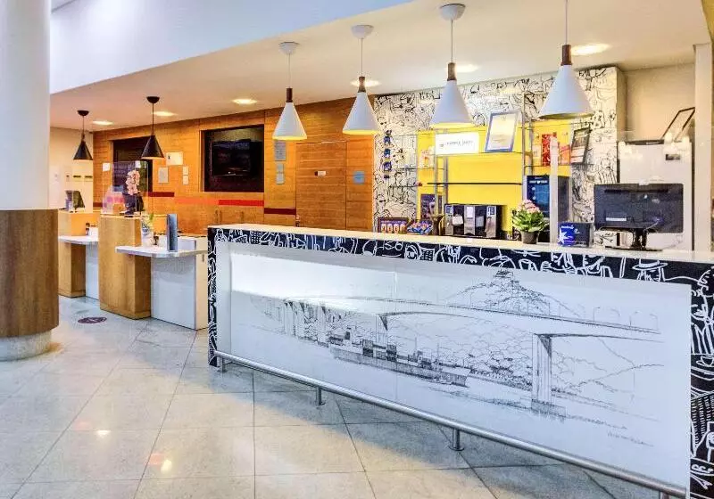 Отель Ibis Vitoria Praia De Camburi