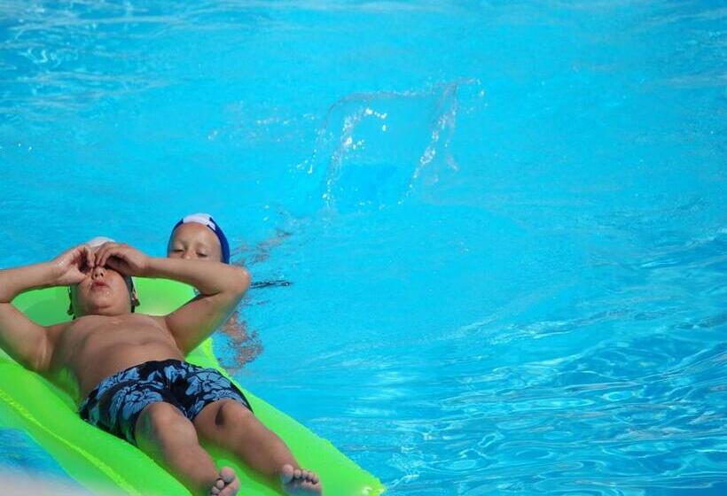 Отель Althea Village Residence