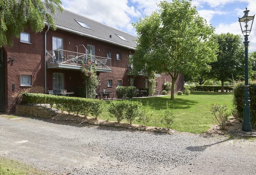 酒店 Ferienwohnungen Burg Blens