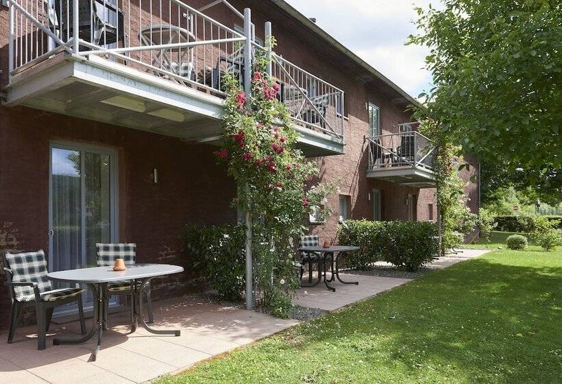 酒店 Ferienwohnungen Burg Blens