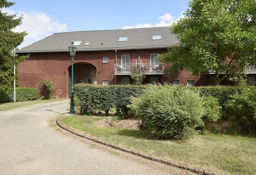 酒店 Ferienwohnungen Burg Blens