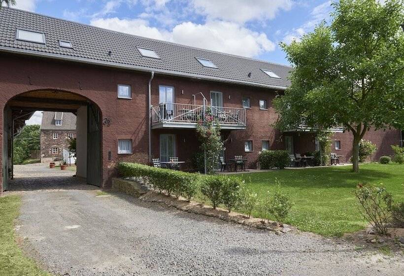 酒店 Ferienwohnungen Burg Blens