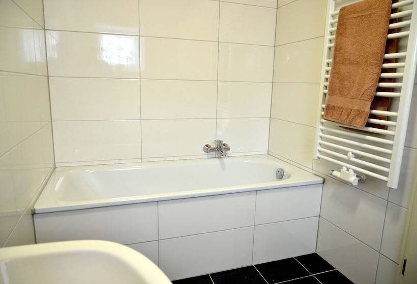 酒店 Ferienwohnungen Burg Blens